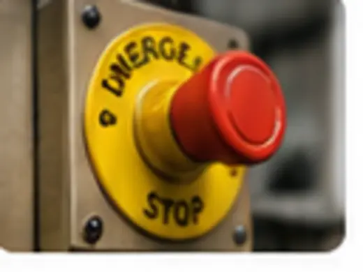 Botão de emergência em máquina industrial